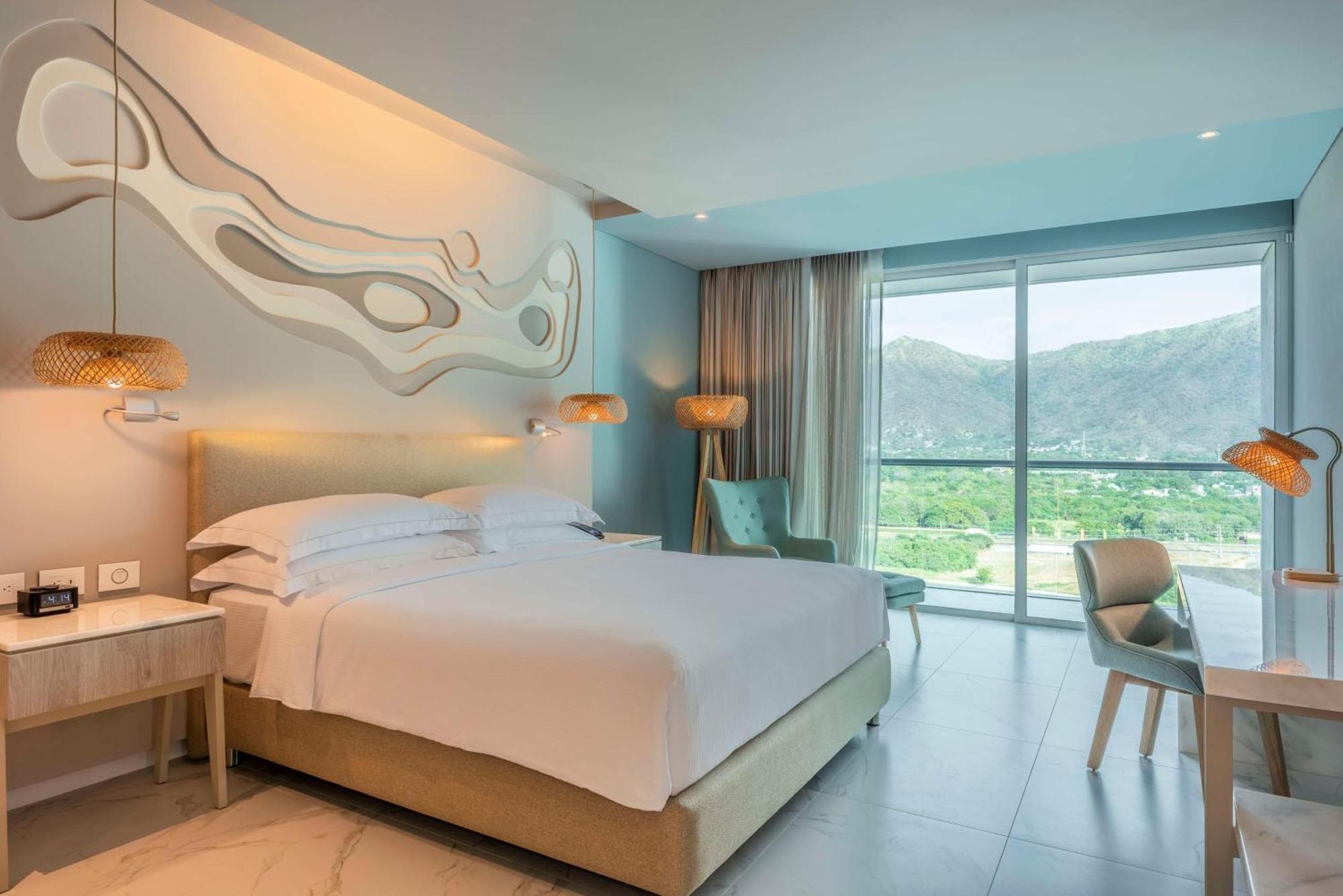 Habitación con balcón y vistas a la ciudad - 1 cama extragrande